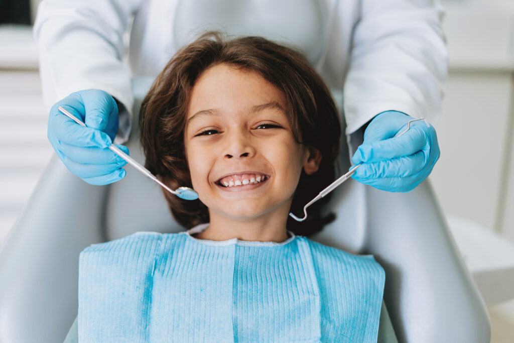 A welcoming kids dentist office environment at Celebration Pediatric Dentistry featuring bright play spaces and modern clinical tech built for stress-free visits. childrens dentist ChampionsGate welcoming Celebration office lobby.